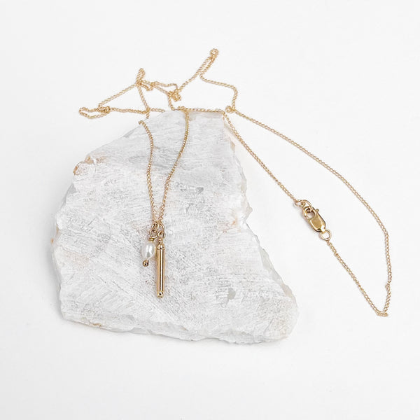 Amy Tamblyn Rice pearl and tube bead charm